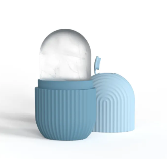 Facial ice tool being used along the cheekbone