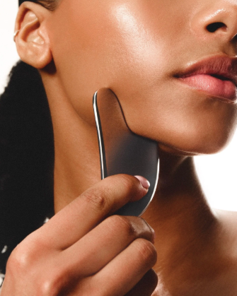 Gua Sha facial massage close-up